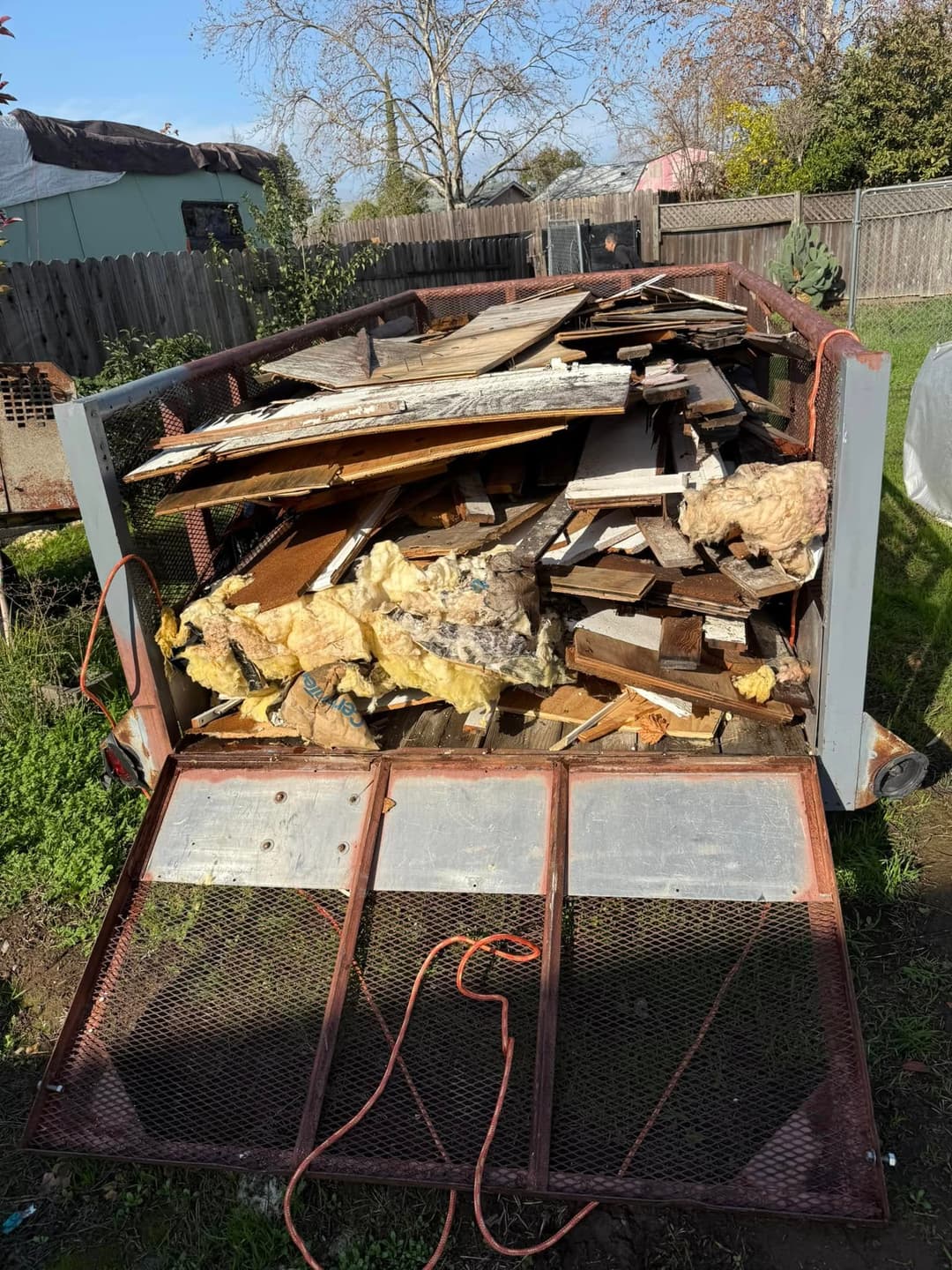 Trailer full of junk and debris after junk removal job in Sacramento California